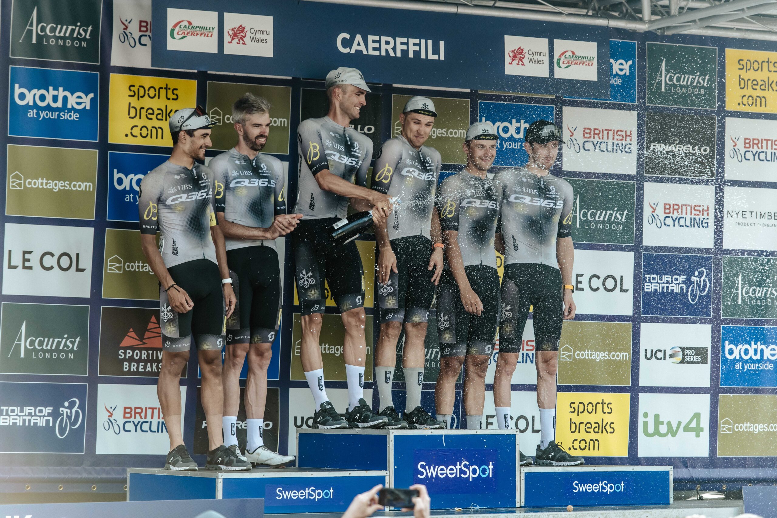 Q36.5 Pro Cycling Team on the podium