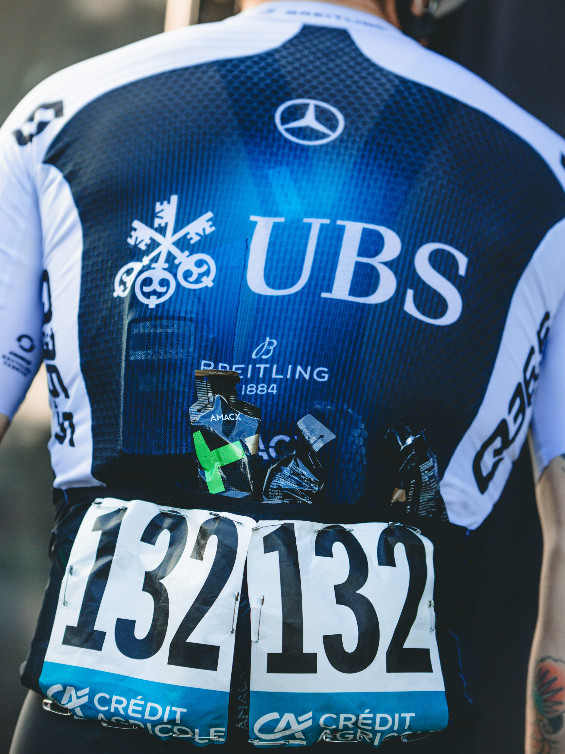 Q36.5 Pro Cycling Team riders fuelling during Milan-Sanremo.